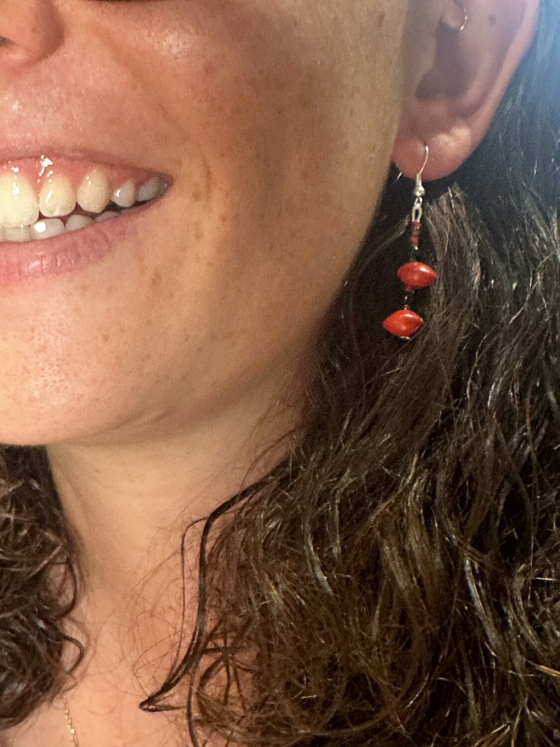 lady-modelling-earrings-with-Red-Sandalwood-beads lady modelling earrings with Red Sandalwood beads
